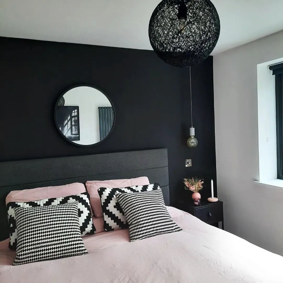 🎨 Midnight by @tikkurila_ireland is a beautiful off-black and that adds richness and depth to any room and works beautifully paired with blush tones accessories as seen here in this bedroom scheme by @by_cli 👌