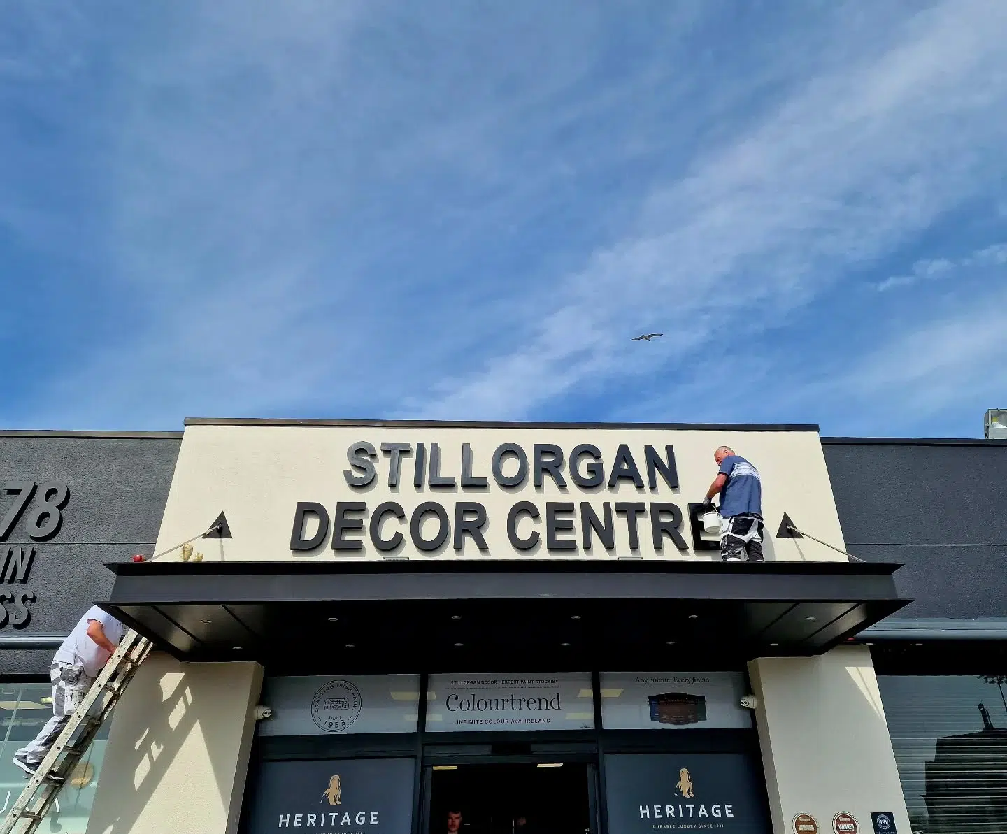 @alandempseydecor hard at work freshening up our store's exterior. ☀️