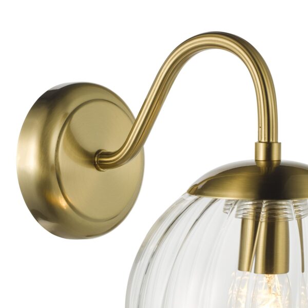 elegant curved arm wall light in natural brass with blown glass globes - Stillorgan Decor